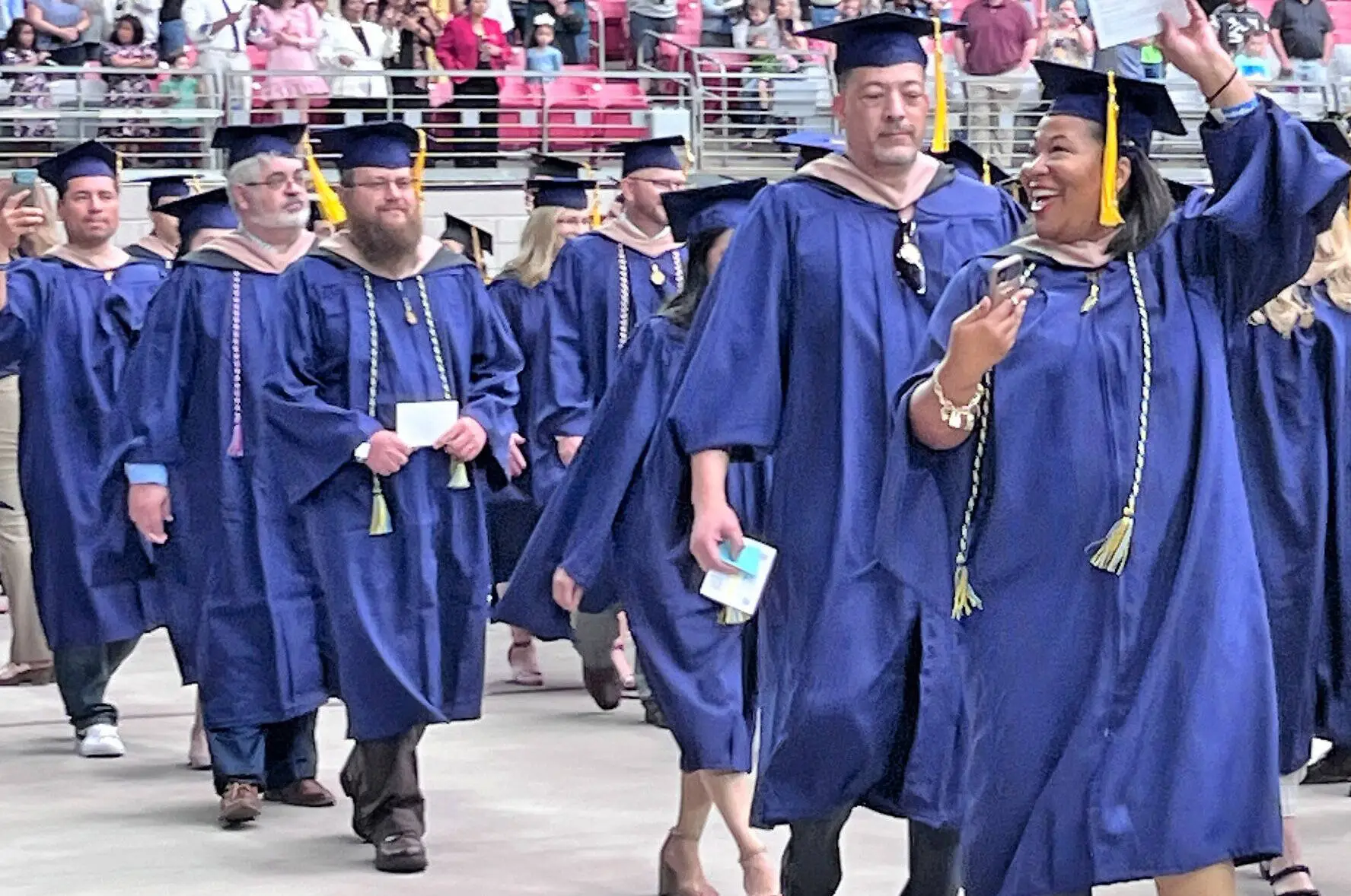 WGU graduates walking in the commencement procession